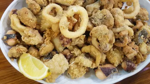Traditional Malaga style battered fried fish and seafood